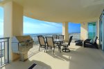 Beach Balcony with room for dining and relaxing. Views to the South and West. Wonderful night views of the city lights.